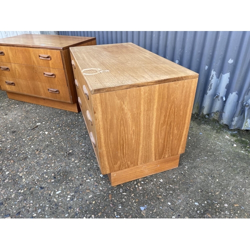 241 - A pair of g plan teak chests of three drawers