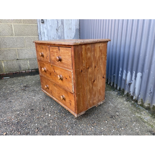 246 - A small antique pine chest of four drawers