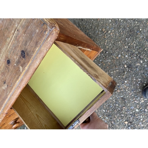 246 - A small antique pine chest of four drawers