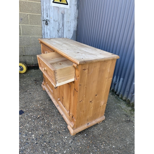 256 - A french pine two drawer and two door  sideboard