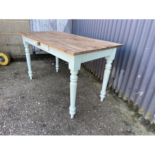 257 - A painted pine kitchen table with drawer