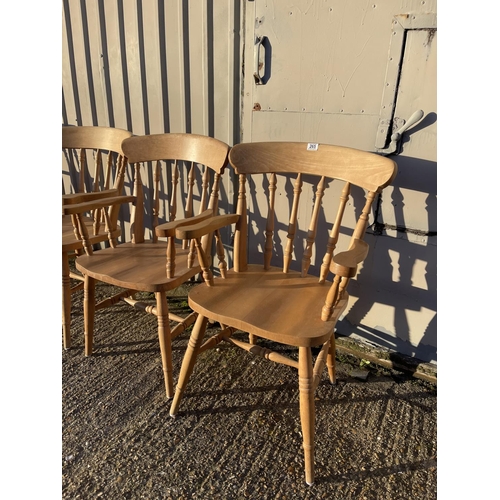 265 - A set of six pine carver chairs