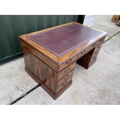 275 - A large reproduction mahogany twin pedestal desk with red leather top 5ft. X3ft