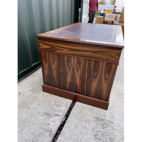 275 - A large reproduction mahogany twin pedestal desk with red leather top 5ft. X3ft