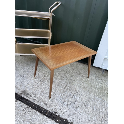 277 - A retro tea trolley, child's chair with drawer and a retro coffee table