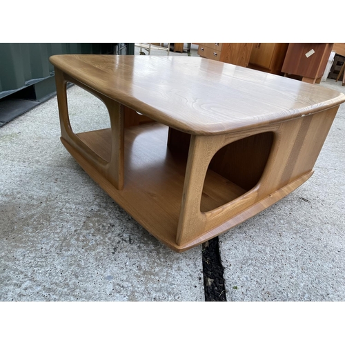 278 - A mid centuey ercol light elm Pandora's box coffee table