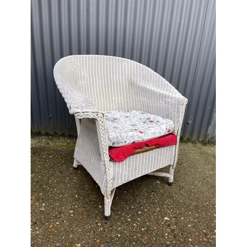 28 - A white lloyd loom chair
