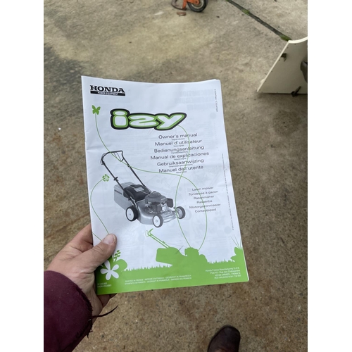 311 - A HONDA IZZY petrol lawn mower - recently serviced with handbook