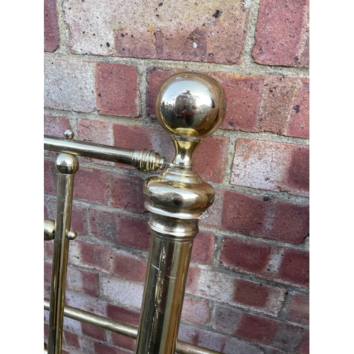 329 - A victorian style brass double bed with fittings and pine boards