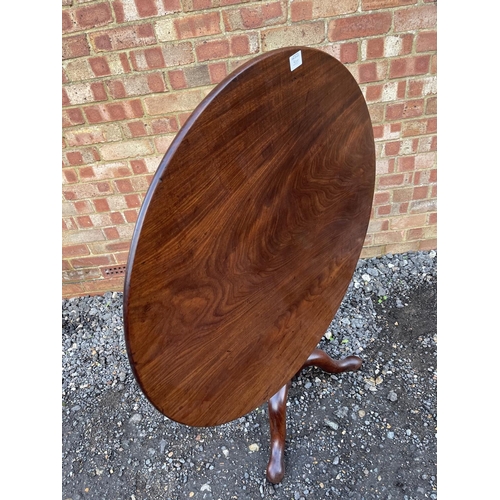 339 - A Georgian mahogany circular snap top tripod table