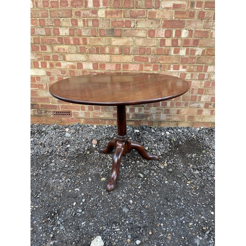 339 - A Georgian mahogany circular snap top tripod table