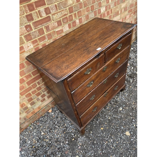 348 - An antique oak chest of five drawers (cut to two sections)