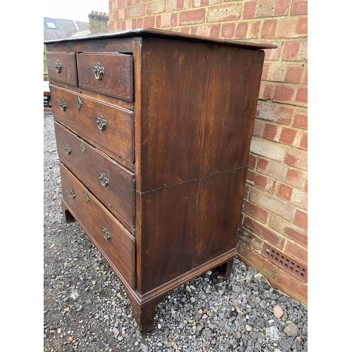 348 - An antique oak chest of five drawers (cut to two sections)