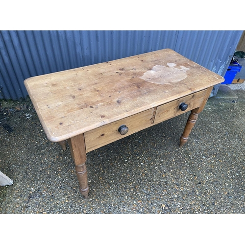 355 - A country pine two drawer kitchen table