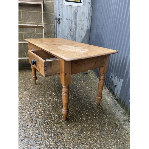 355 - A country pine two drawer kitchen table