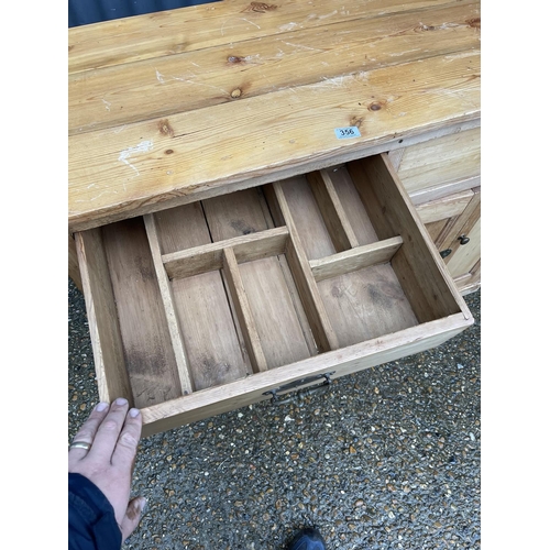 356 - A country pine sideboard with two drawers ver four cupboard doors