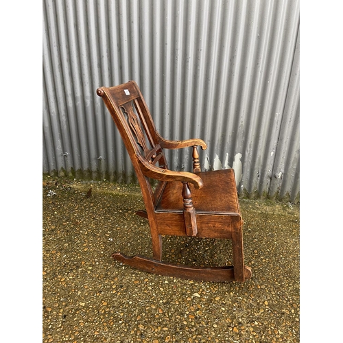 365 - An Edwardian mahogany rocking chair