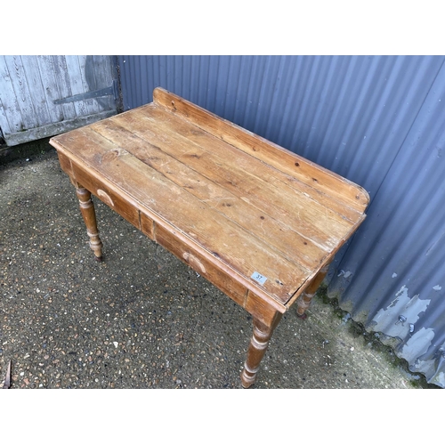 37 - A country pine two drawer console table