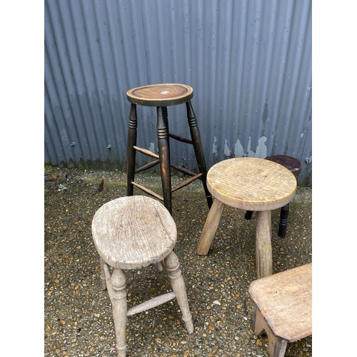 370 - Five vintage milking stools