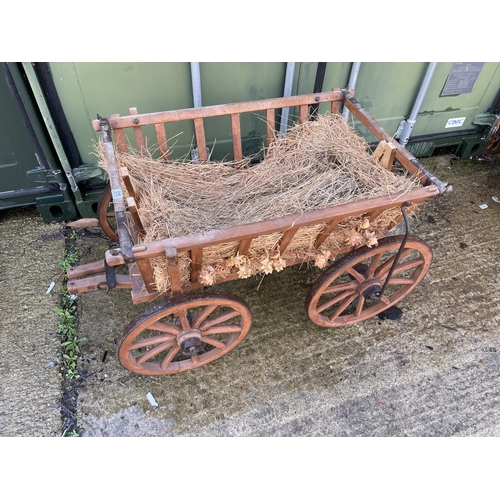 375 - A four wheel decorative hand cart