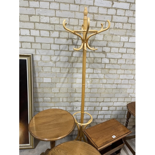 385 - A pair of oak wine tables, barley twist table, magazine rack, hall stand and a floor lamp