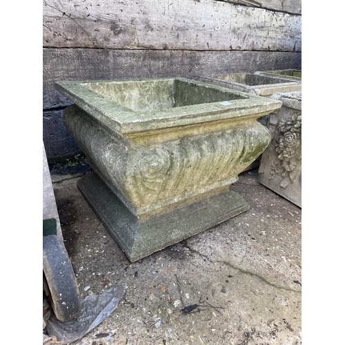 390d - A large square form stone planter 57 square x 44 high