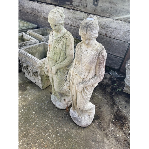 397 - A pair of concrete lady statues 99cm tall