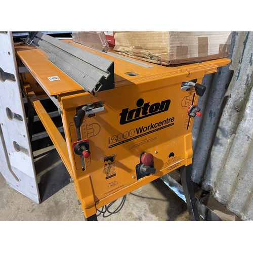 401 - A triton 2000 series folding power saw bench fitted with makita saw, together with a jig, an extract... 