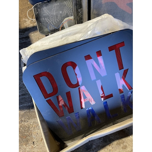 406 - A large collection of American crosswalk signs for repair and reassembley. Various 'don't walk & wal... 