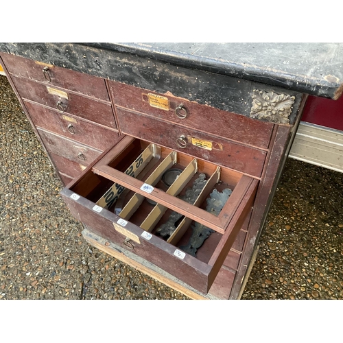 412 - A mahogany bank of 16 haberdashery style drawers