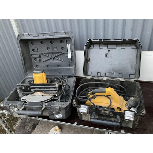 422 - A cased dewalt planer and cased dewalt circular saw