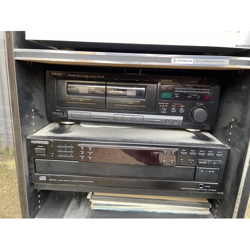 43 - A Hitachi stereo and speakers with Kenwood, teac, and absolute stereo sections and pair of hitachi s... 
