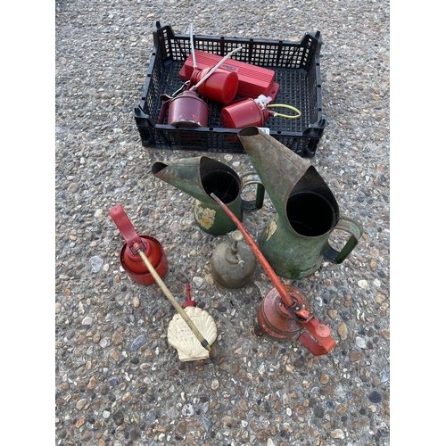 443 - Collection of vintage oil cans and bottles