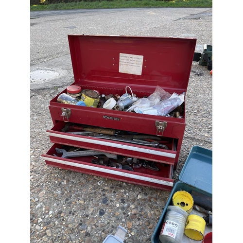 444 - Staxck on red cabinet with hole cutters and three other cases of hole cutters etc