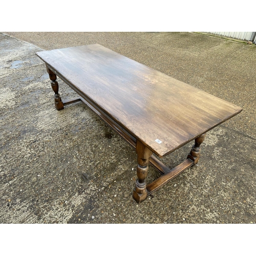 46 - A large refectory style oak dining table 230x90