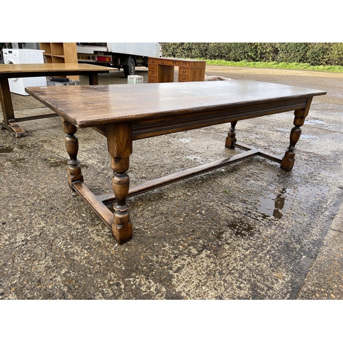 46 - A large refectory style oak dining table 230x90