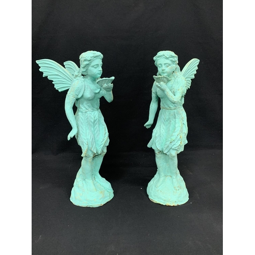 482 - Pair heavy cast iron fairy figures, height 50cms