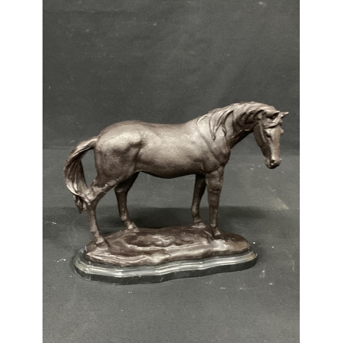 483 - Bronze horse on marble base, height 23cms, length 25cms