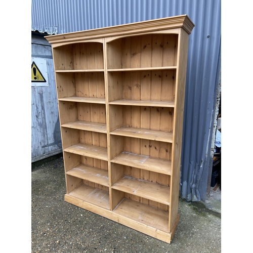 49 - A solid pine double width open fronted bookcase 140x200x30
