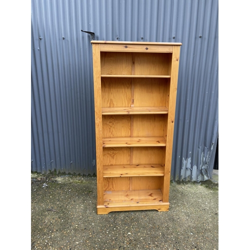 50 - A modern pine open fronted bookcase
