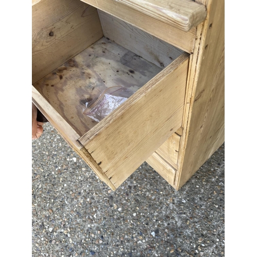 50k - A country pine linen press / larder cupboard with two door top over four drawers  (with key)