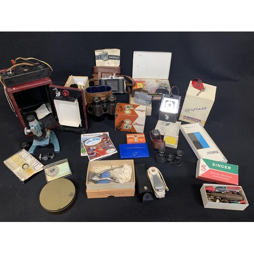 575 - Cased Microscope and slides, Isolette Camera, binocs, viewmaster,  photographic accessories and Gnom... 