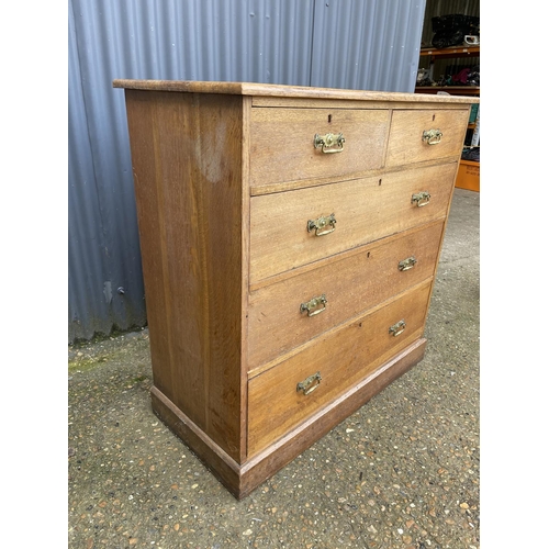 59 - A large antique oak chest of five drawers with brass handles 107x50x1