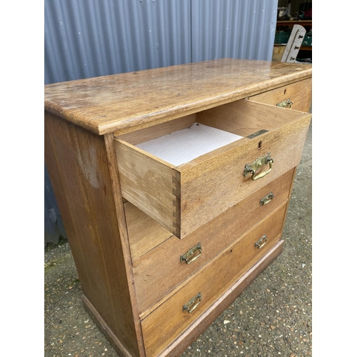 59 - A large antique oak chest of five drawers with brass handles 107x50x1