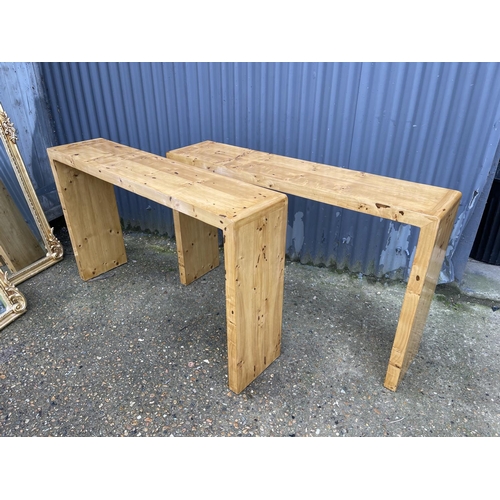 66 - A pair of Art Deco rectangular maple console tables