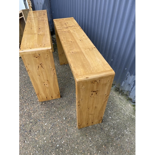 66 - A pair of Art Deco rectangular maple console tables