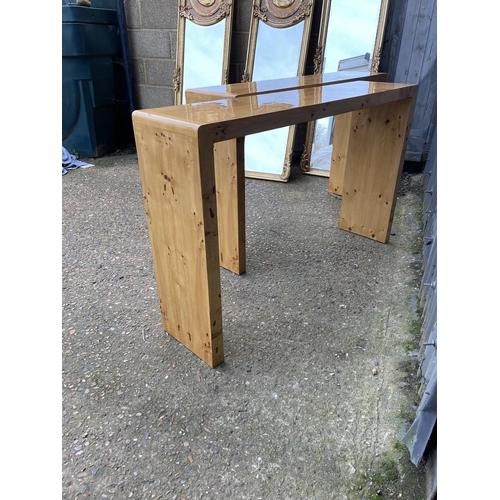 66 - A pair of Art Deco rectangular maple console tables