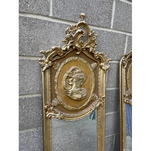 67 - A pair of large gold gilt hallway mirrors with lady decorative panels 180x54