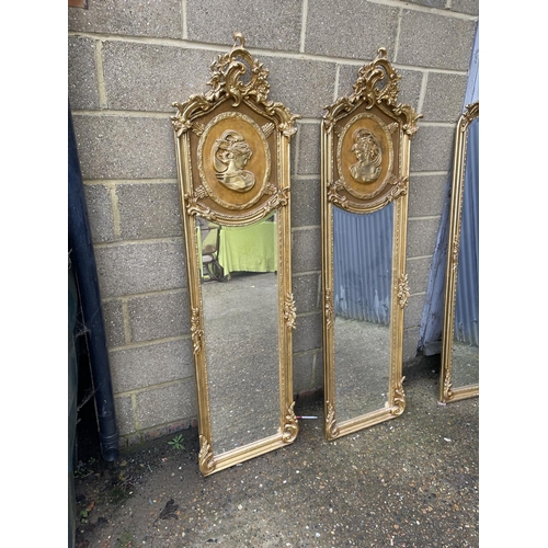 67 - A pair of large gold gilt hallway mirrors with lady decorative panels 180x54