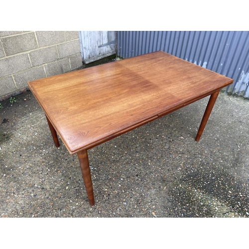 72 - A danish style teak drawer leaf dining table